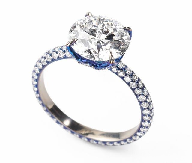 Milky diamond engagement ring showing cloudy inclusions