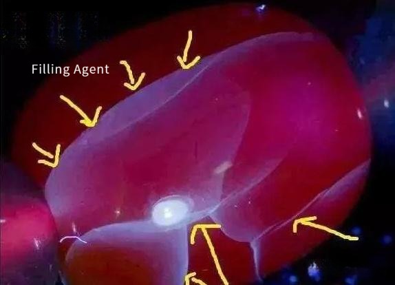 South Red Agate (Nan Hong) showing fissures injected with a binding resin to enhance firmness, hardness, and durability.