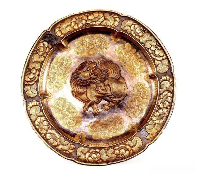 Tang Dynasty gilt silver lion plate featuring intricate traditional craftsmanship