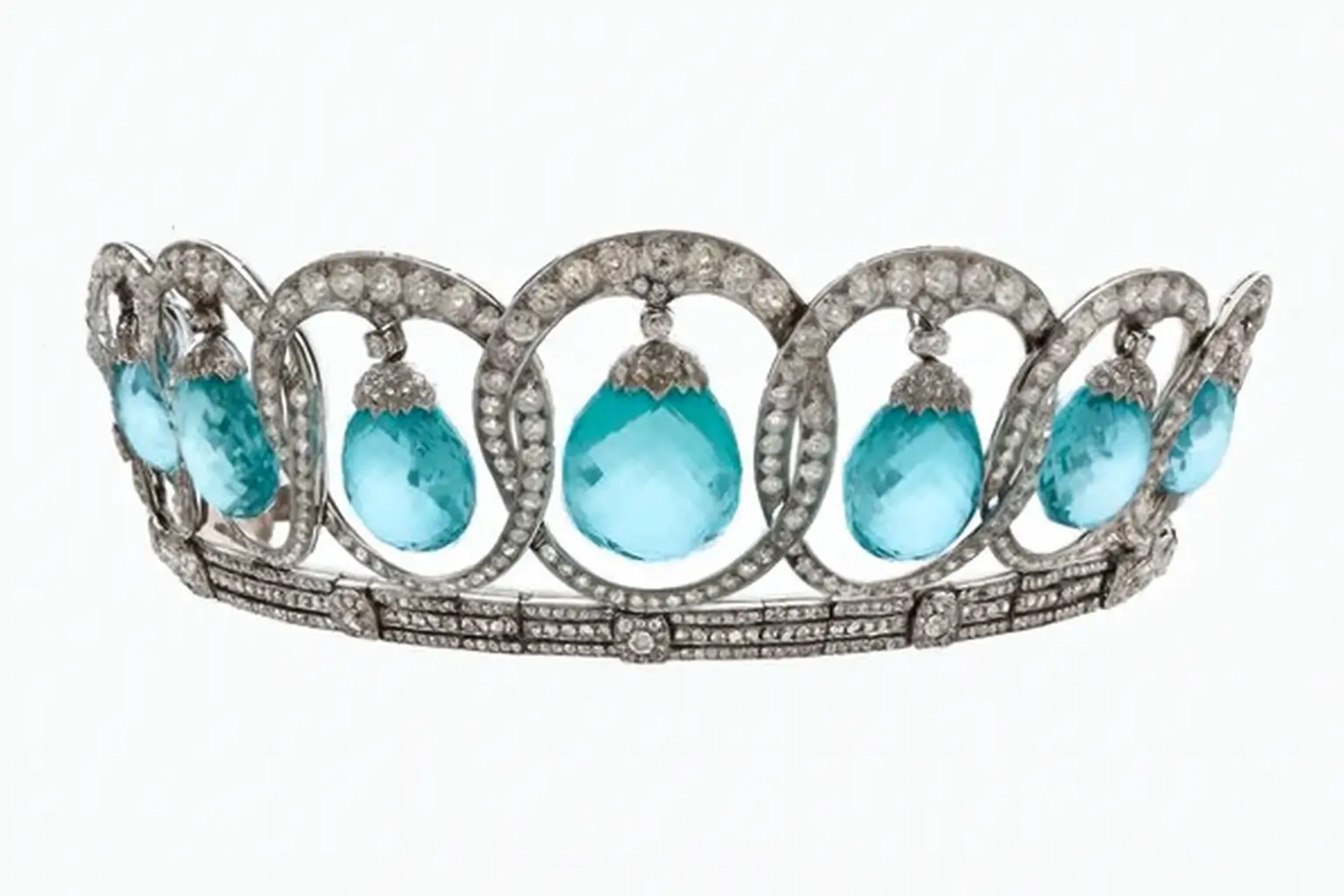 1935 Bulgari Platinum Crown with Aquamarines, featuring a luxurious design of pear-shaped aquamarine gemstones surrounded by diamonds.