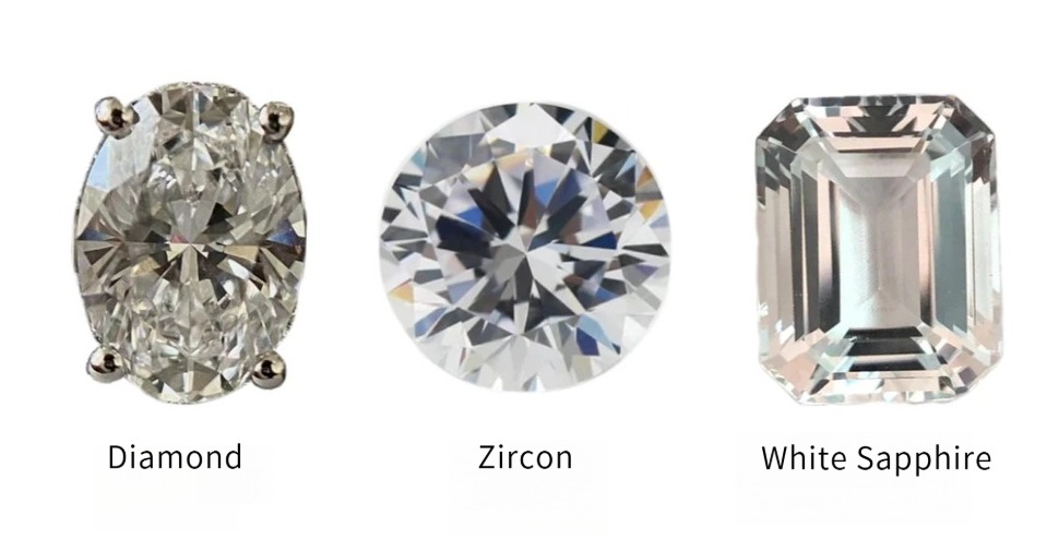 Side-by-side comparison of a colorless diamond and a white sapphire, highlighting the difference in brilliance and fire.