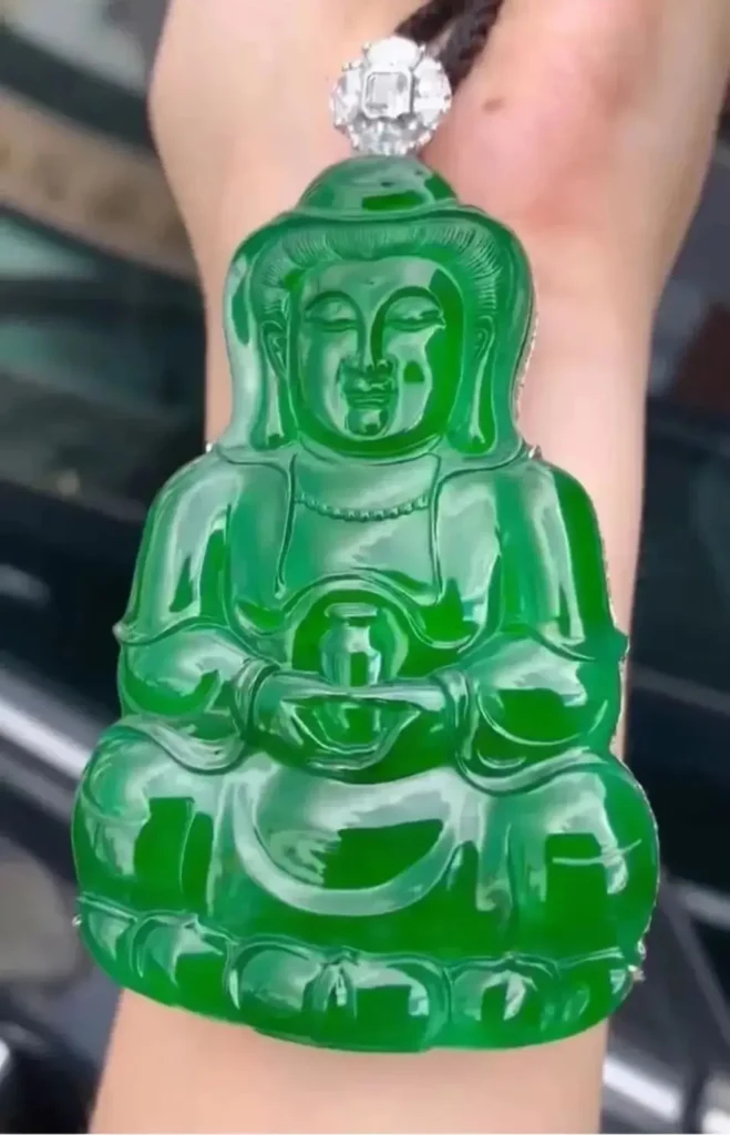 Guatemalan jade pendant showing blue-green tones often mistaken for Imperial Green jade.