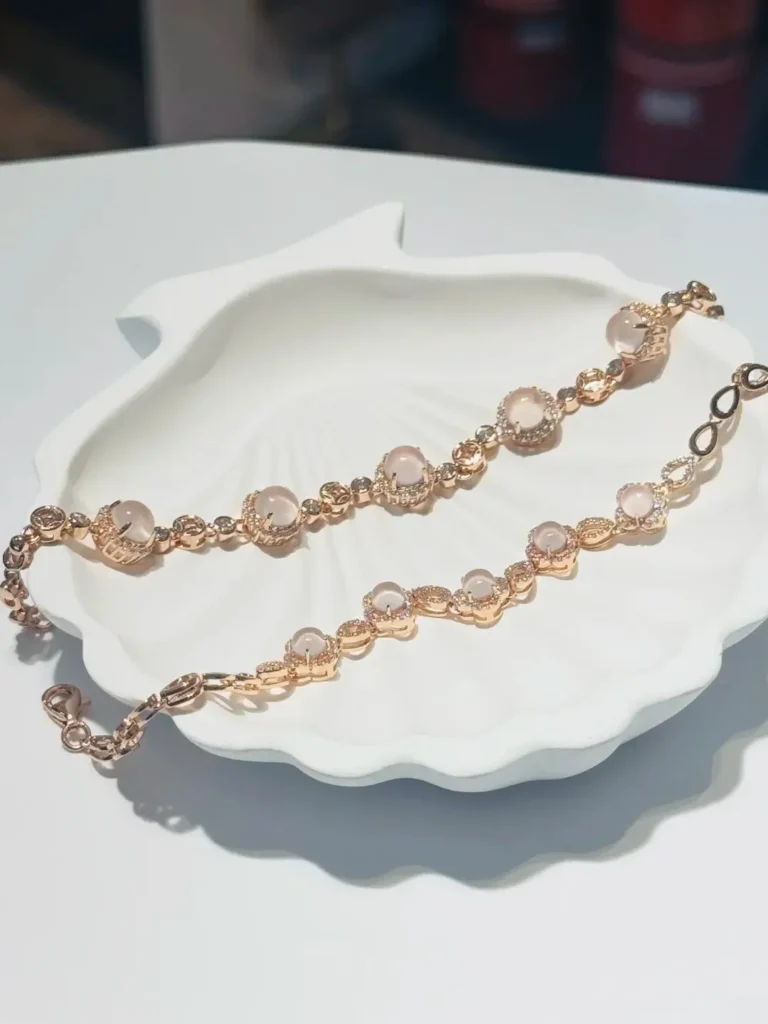 Jewea Rose Quartz bracelet with star effect.