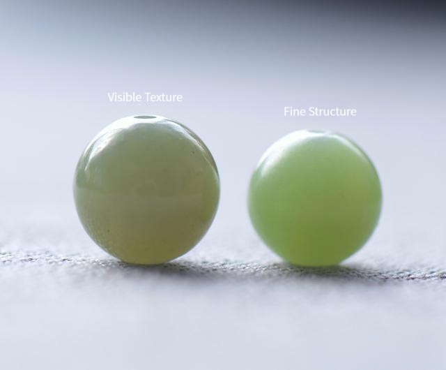 Comparison of coarse versus fine structure in Nephrite Jade beads.