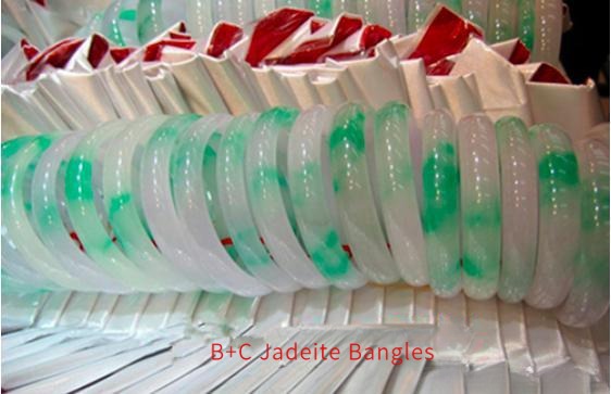 Examples of Type B+C jadeite bangles featuring artificial dye injection and resin-filled acid-etched structures.
