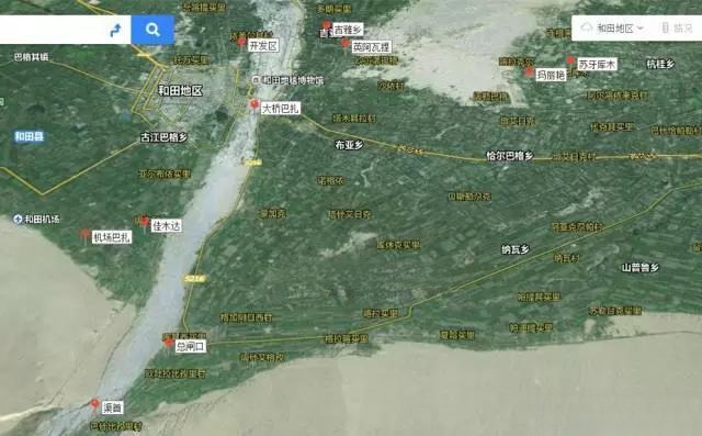 Satellite map of the Yulongkashi River showing the riverbed (gray), farmlands (green), and primary jade mining areas (yellow-gray).