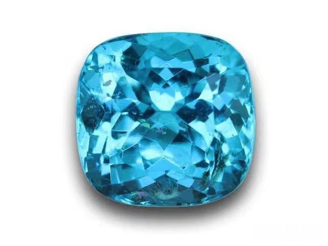 A 3.14-carat oval-cut Brazilian Paraíba tourmaline exhibiting intense, highly saturated neon blue color.