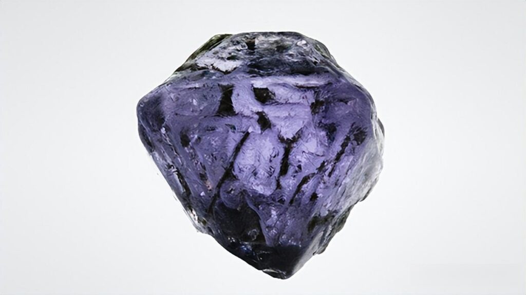 Faceted Afghanistan Iris Purple spinel from Badakhshan exhibiting a lavender-to-purple hue and luster.