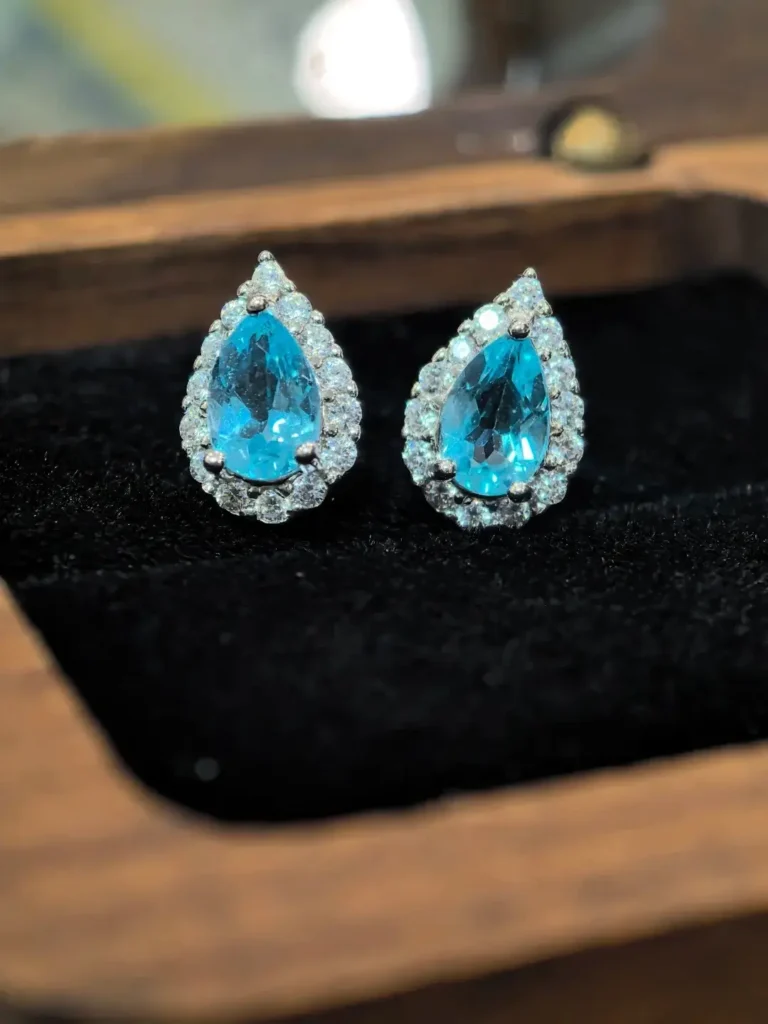 Paraiba Color Apatite teardrop earrings showcasing vibrant blue-green gemstones in elegant jewelry design.