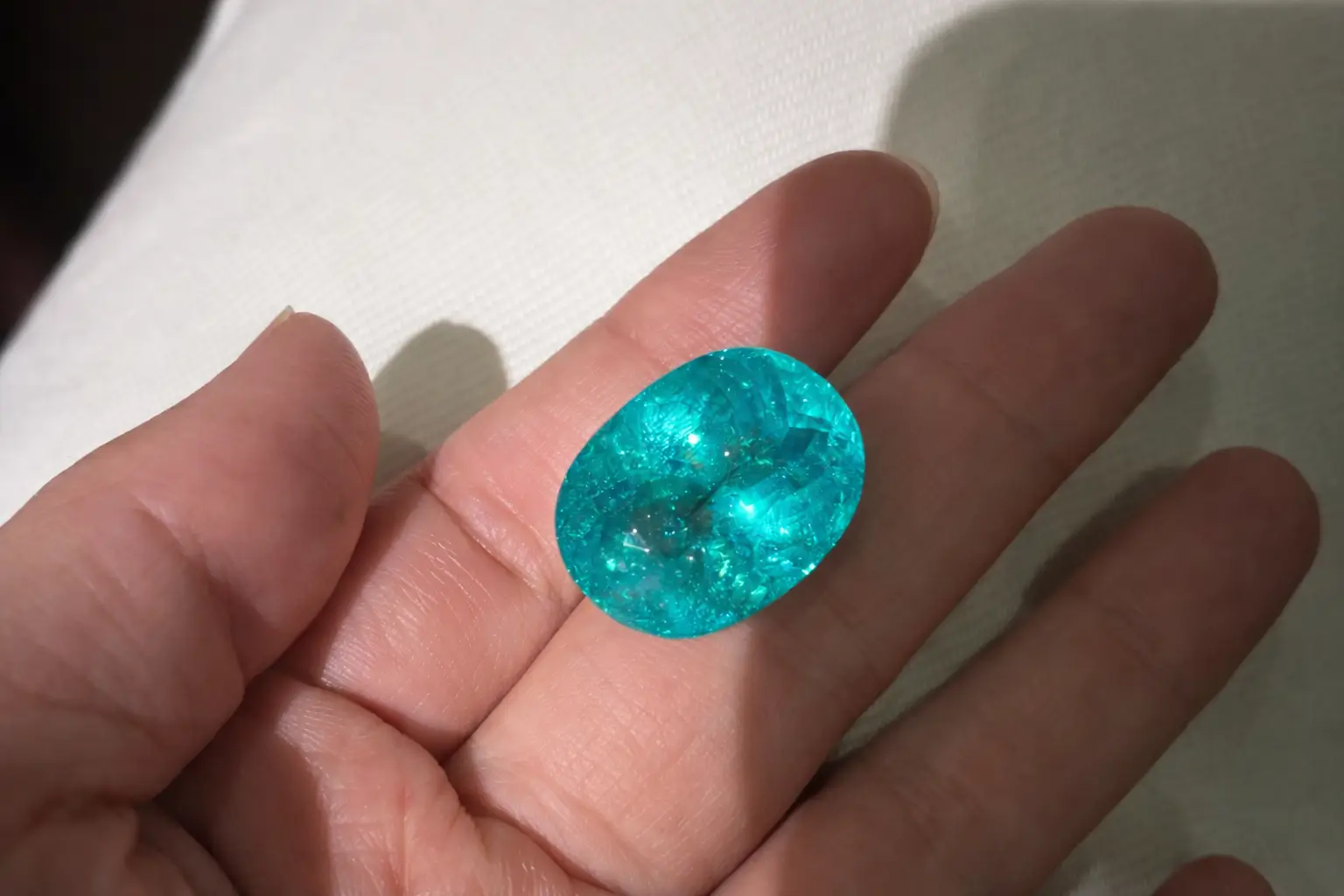 Brazilian neon blue Paraiba tourmaline with high saturation, vivid glow, and strong copper-related coloration