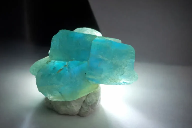 Rare Chinese apatite crystal displaying Paraiba color with strong pleochroism, now extinct and highly collectible.