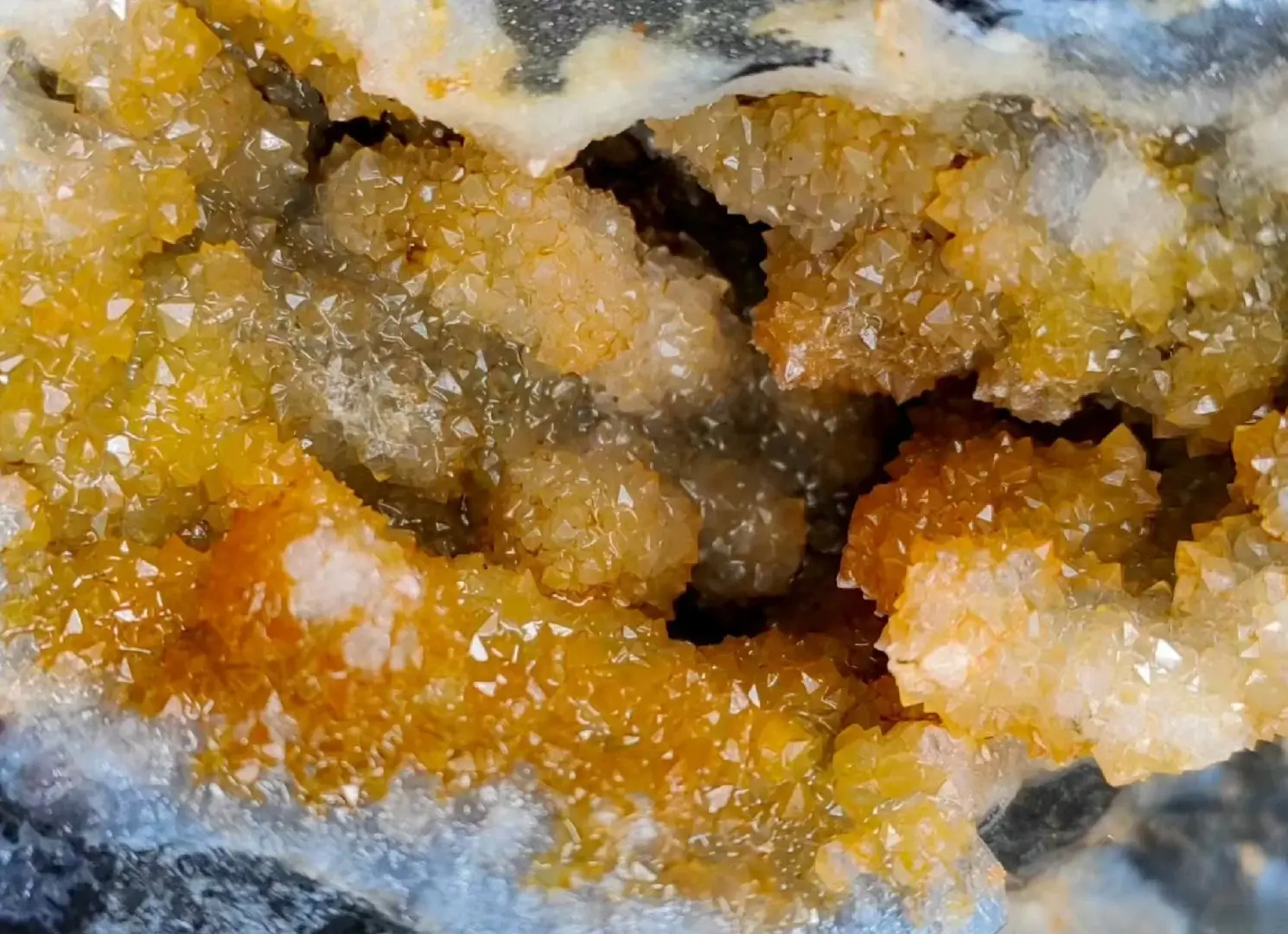 Quartz geode formed during the Cretaceous period, created by silica-rich hydrothermal fluids in fractures.