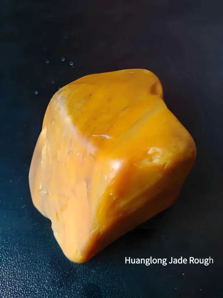 Huanglong Jade rough stone showing semi-transparent to opaque quartzite jade structure.