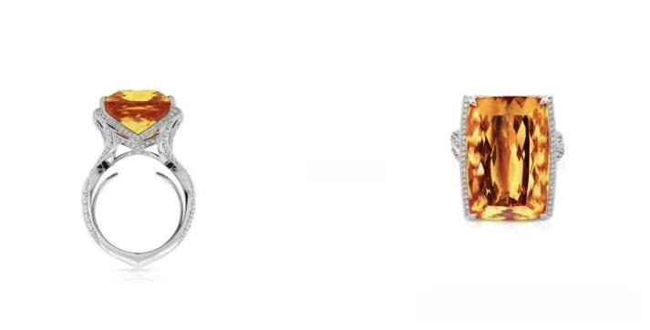 Impressive 42.16-carat cushion-cut natural stone featuring a vivid yellow-orange hue in a diamond ring.