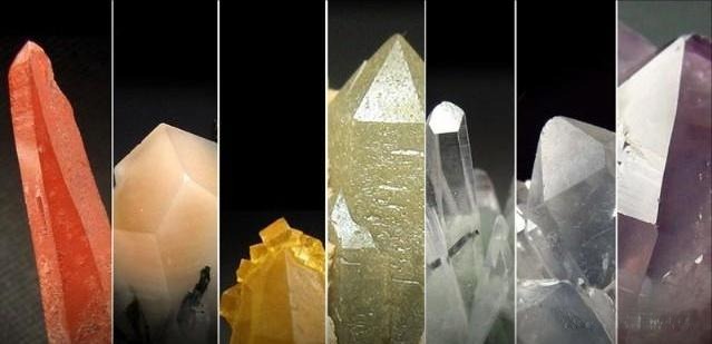 A collection of colorful single-crystal quartz clusters from Jiangsu, China, showing transparency.