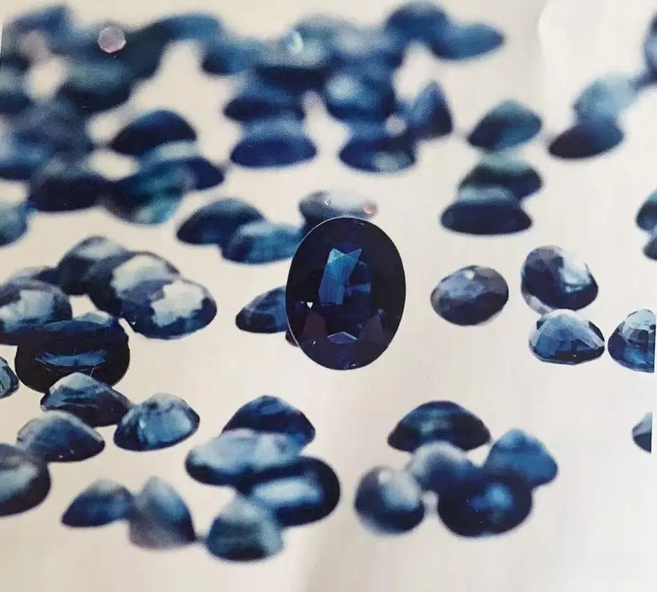 Deep inky blue-violet sapphires from Phrae, showcasing the rich saturation of Thailand gemstones.