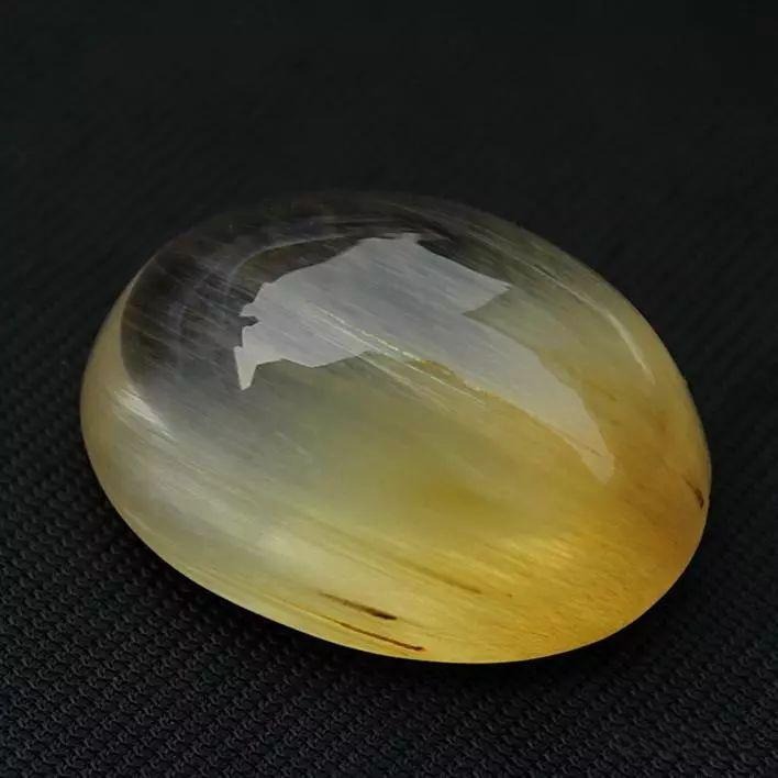 Rabbit Hair crystal with ultra-fine, fur-like needle inclusions in red, white, yellow, or green.