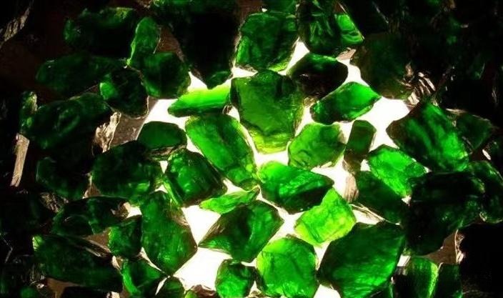 High-quality Russian chromium diopside gemstone showing vibrant green color and transparency, sourced from Siberia.