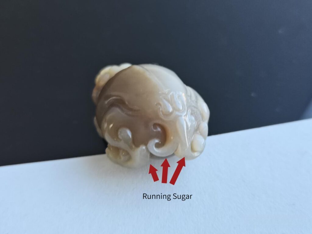 Fading of a full-sugar Russian jade Pixiu over 12 months.