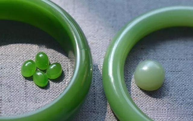 Color comparison of Russian nephrite: vibrant green, spinach green, duck-egg green, and pale green.