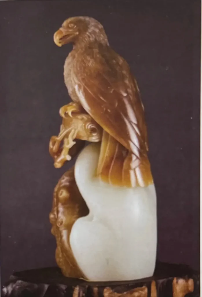 Finely carved Sugar-White Hetian eagle showing stable color distribution.