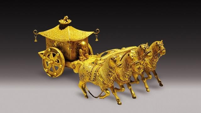 Tang Dynasty chariot adorned with intricate granulation, showcasing exquisite craftsmanship and luxurious design.