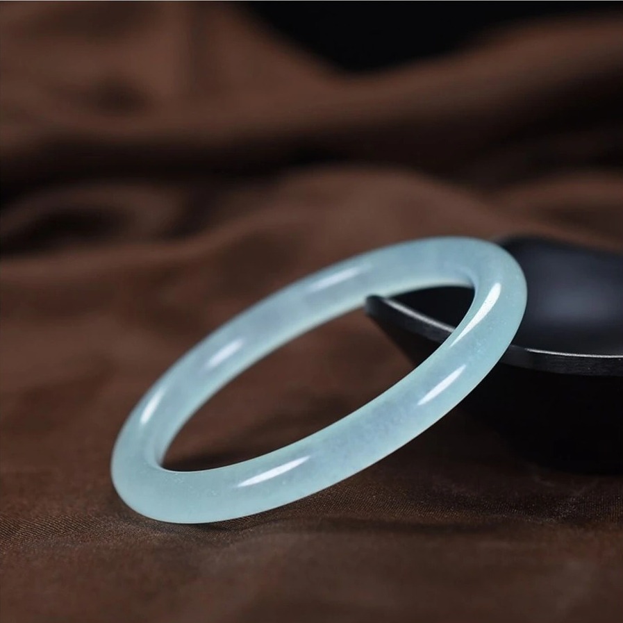 Bluish-green bracelet with a subtle, misty gray undertone and semi-matte finish.