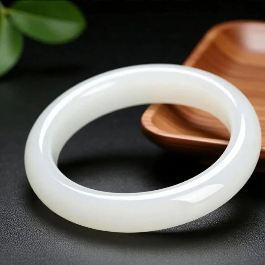 Milky white Shetaicui quartzite bracelet with a flawless surface and smooth, buttery texture.