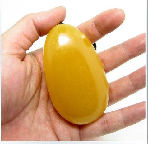 A dry jade specimen coated in mineral oil to create an artificial, slippery surface.