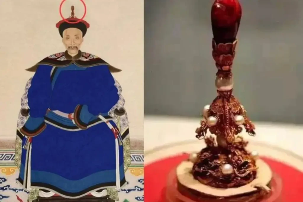 A Qing Dynasty first-rank official in court robes with a red gemstone hat finial.