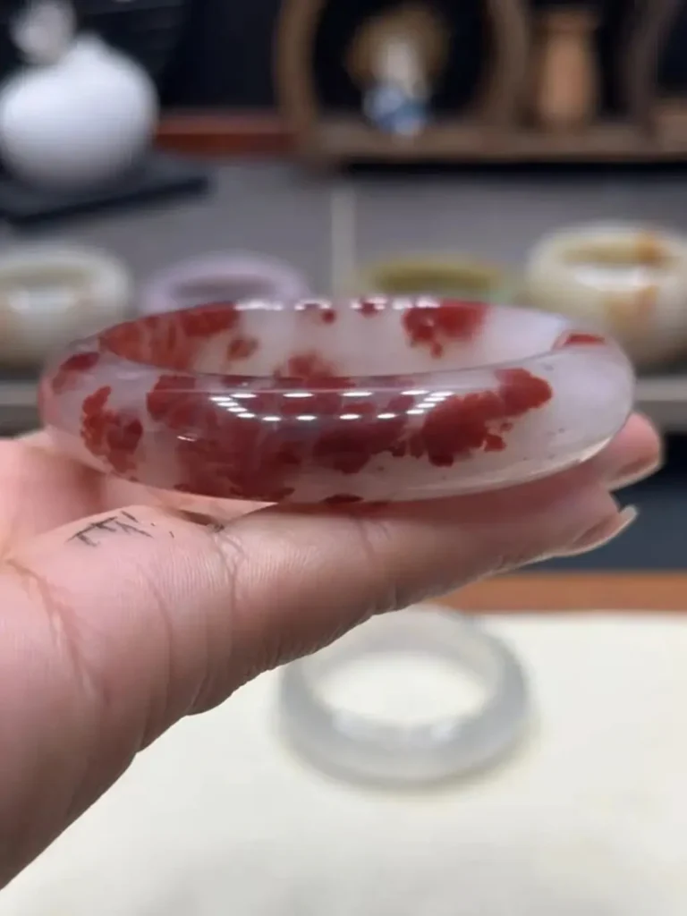 White Shetaicui quartzite bracelet with snowy patterns on a clean, minimalist white background.