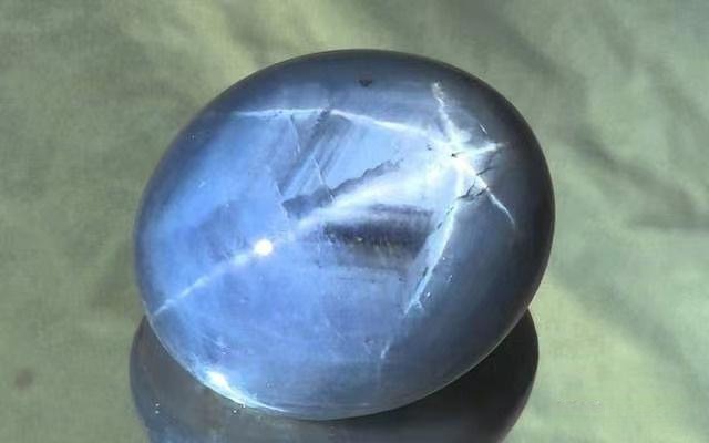The Star of Adam, a 1404.49-carat blue star sapphire with a distinct six-ray asterism.