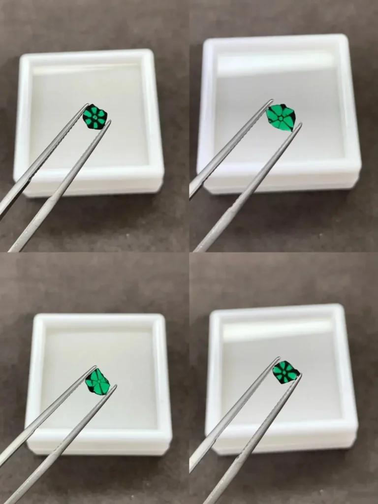A set of four vibrant Trapiche Emerald cabochons, each showing a unique six-arm radial pattern.