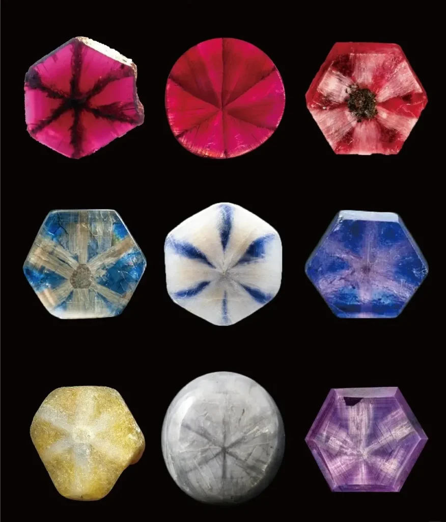 A side-by-side view of a Trapiche Ruby and a Trapiche Sapphire showing dark radial spokes.