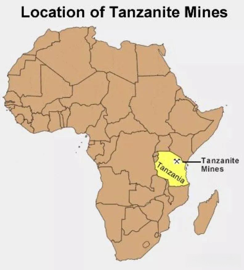 The rugged terrain of a tsavorite mining area in Tanzania, showing active excavation sites.