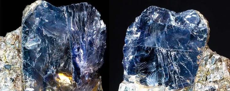 Two unpolished iolite crystals showing natural blue-violet tones and semi-transparent texture.