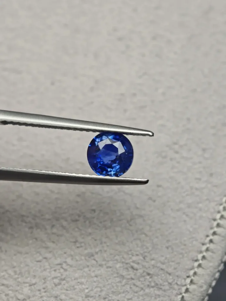 A 1.07ct unheated Sri Lankan sapphire showing distinct hexagonal color zoning in blue stripes.