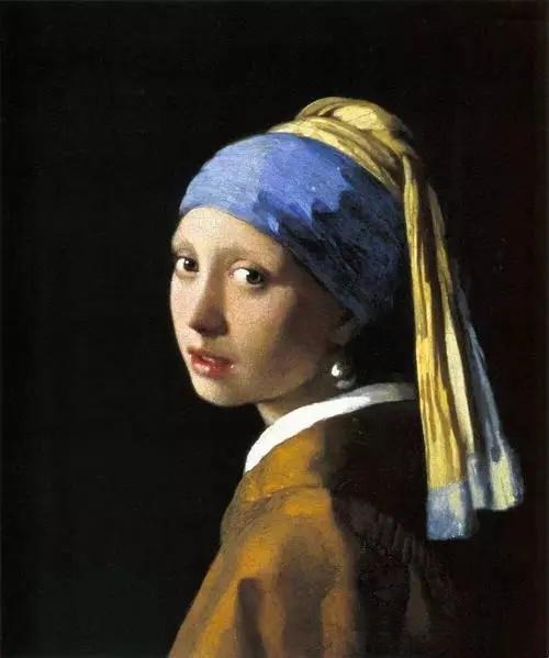 Vermeer's Girl with a Pearl Earring featuring a vivid blue headband painted with ground lapis lazuli.
