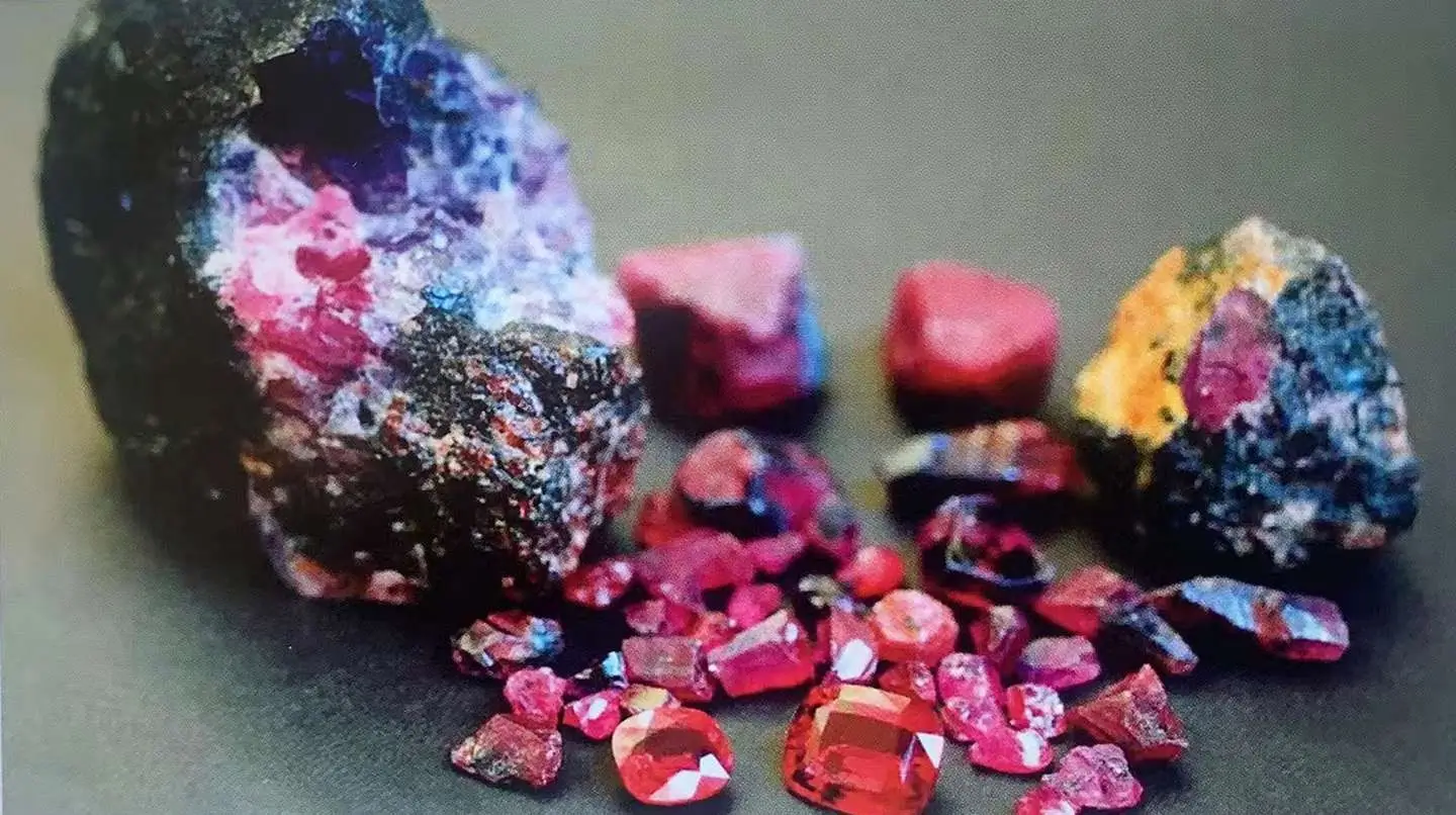 Red Winza ruby crystals and host rock matrix from Tanzania, a rare Tanzania gemstone.