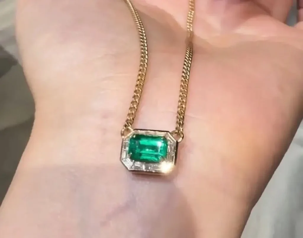 18k gold Cuban-link necklace featuring a custom-set natural green gemstone pendant.