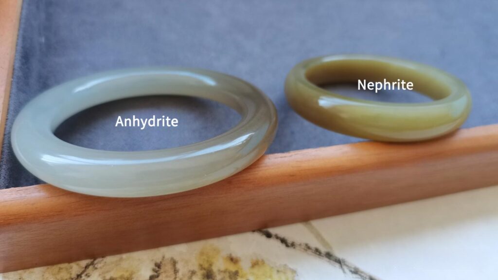 Side-by-side comparison of an Anhydrite fake Nephrite jade and authentic Sugar-White Nephrite.