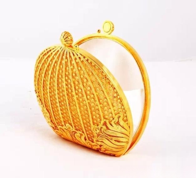 The "Prosperity" (Fan Hua) gold Filigree & Inlay handbag presented as a national gift during the 2014 APEC summit.