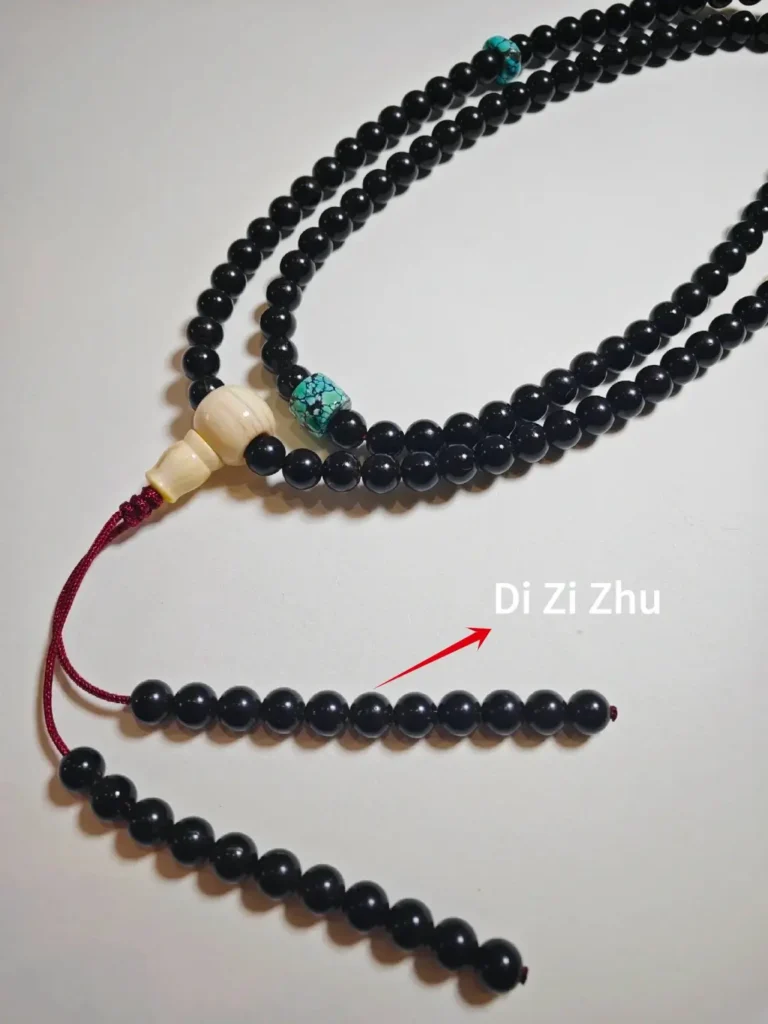 Diagram of Mala Beads Anatomy showing a 108 bead coconut shell mala with arrows marking disciple beads position.