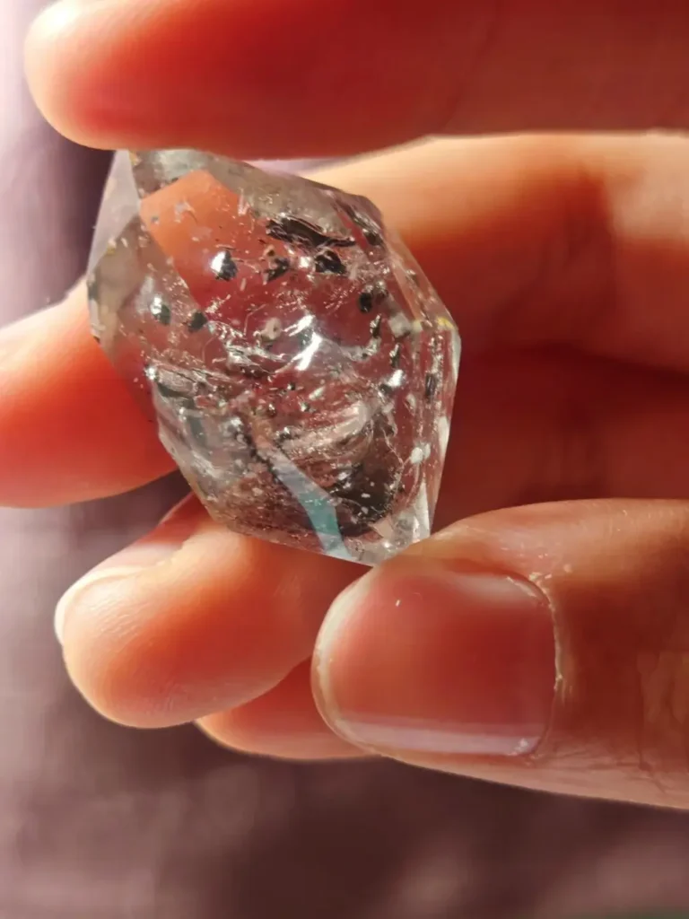 A raw Enhydro Quartz crystal containing a moving bubble, one of the most fascinating types of quartz crystals.