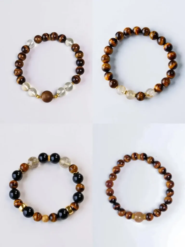 Four unique natural Tiger’s Eye bracelets displaying various golden and brown chatoyant patterns.