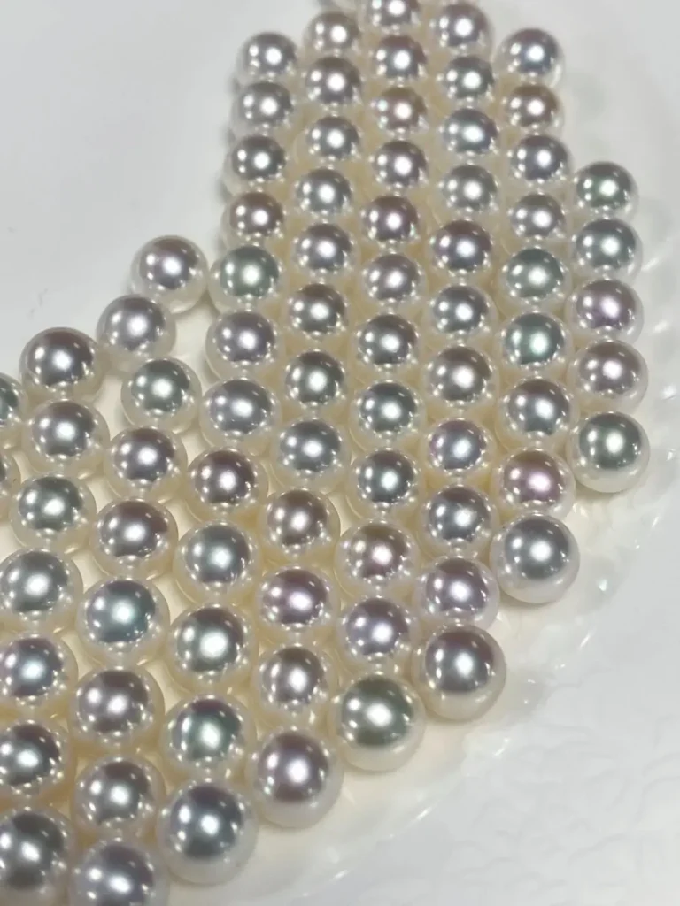 High-luster freshwater pearls displaying prominent pink and rose overtones.