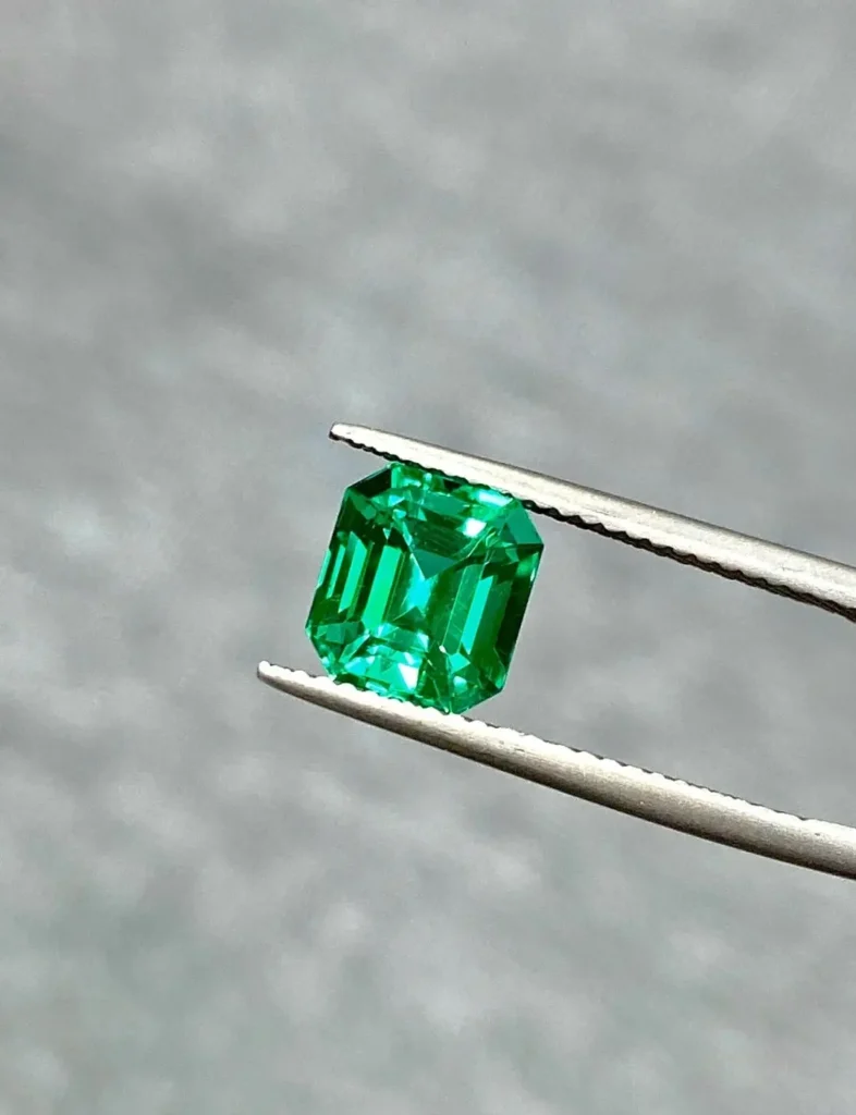 High-clarity Muzo Colombian emerald showcasing exceptional transparency and vivid green hue.