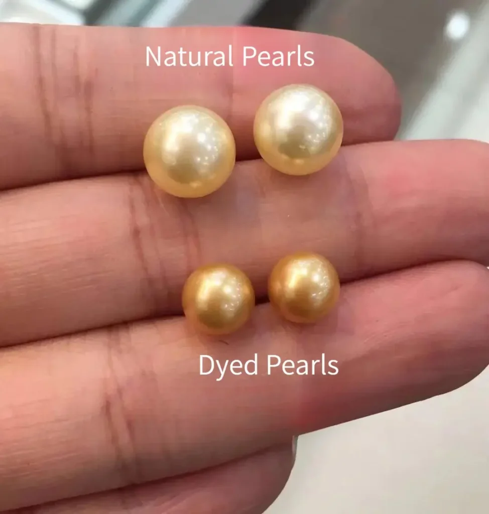 Comparison of natural lustrous pearls versus dull, matte dyed pearls.