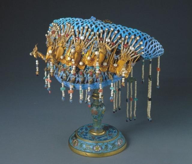 Qing Dynasty diadem with kingfisher feathers, pearls, and gemstones in a five-phoenix design.