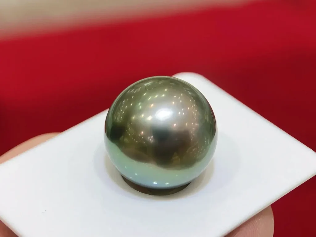 Rare 20mm Tahitian black pearl, a unique treasure with no comparable jewelry alternatives.